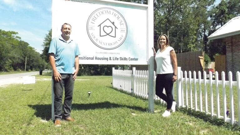 Freedom Life Founders with Sign