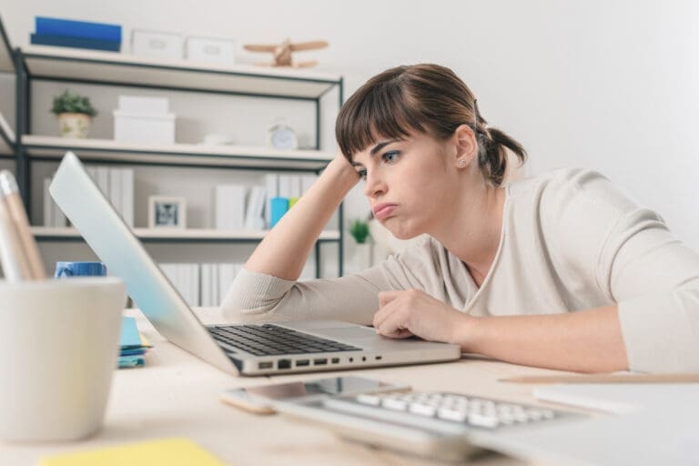 Disappointed Woman Working With A Laptop