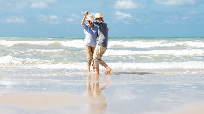 Tortoise Seniors Dancing On Beach Istock 1322107306
